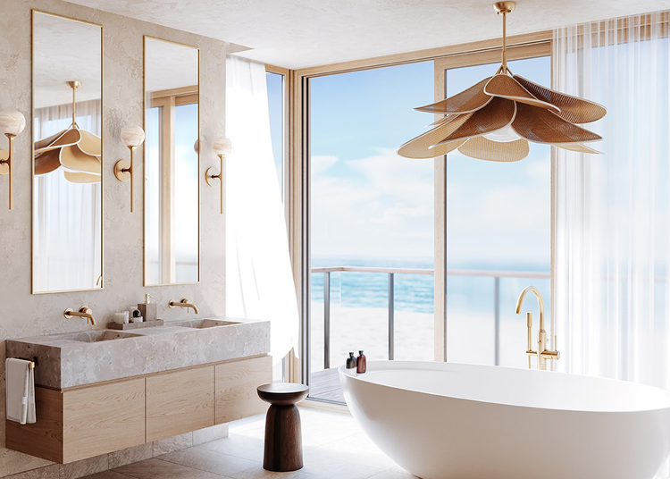 Well-lit bathroom featuring layered ceiling and vanity lighting
