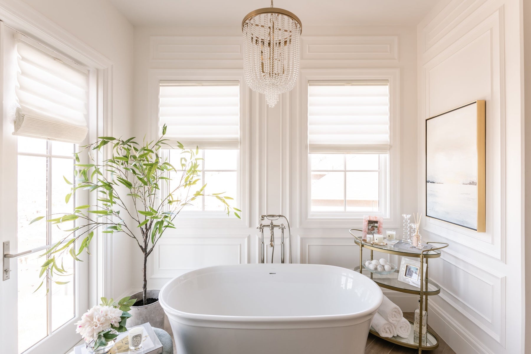 Linear ceiling light providing balanced illumination over a long surface