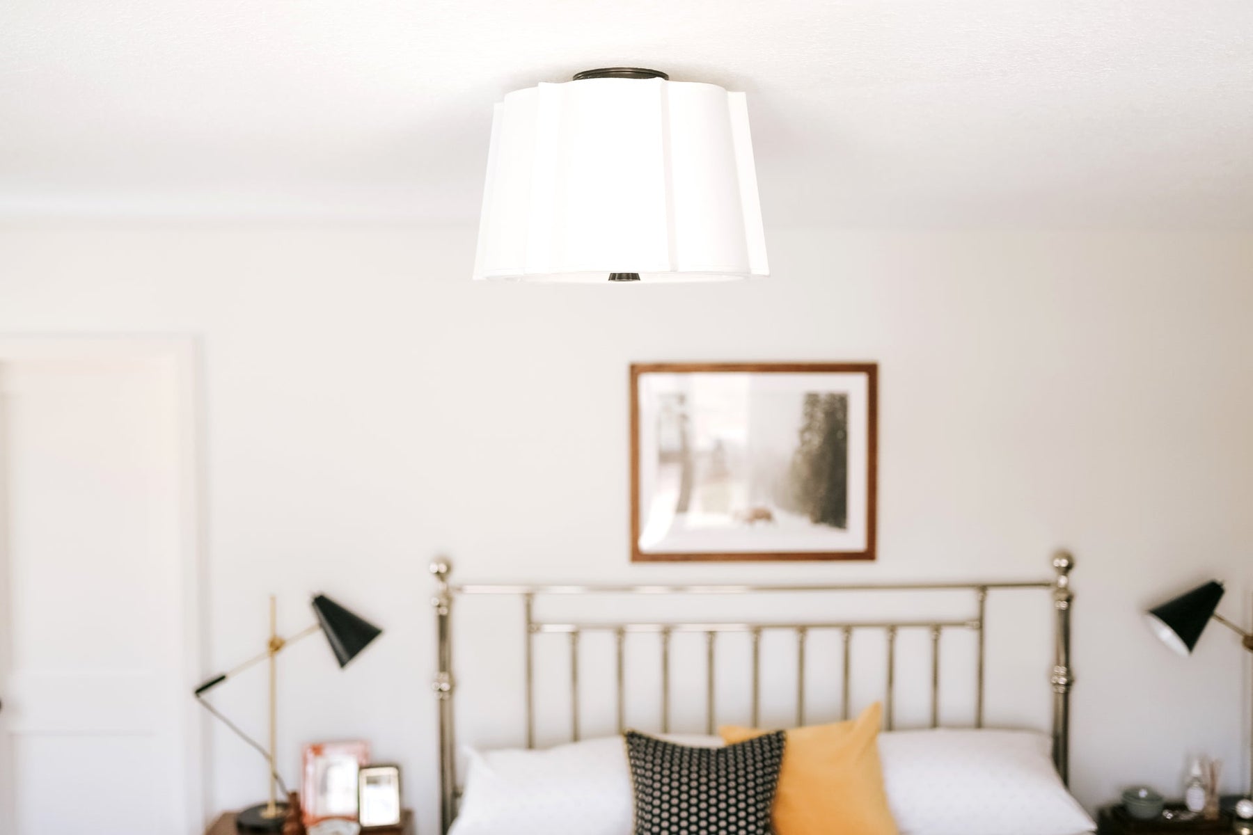 Suspended ceiling fixture creating focused light and visual interest